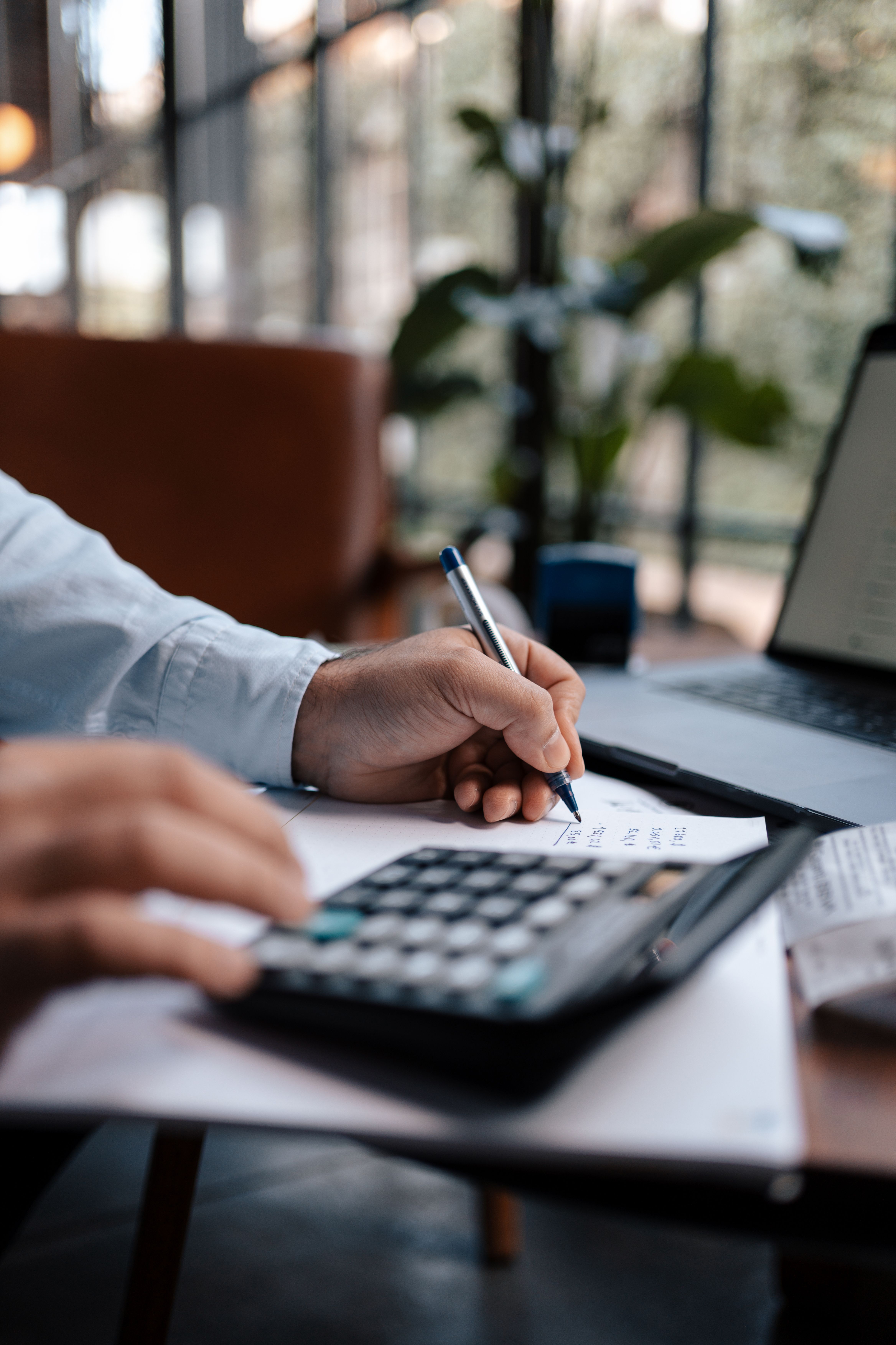 Client reviewing a written investment report during a consultation